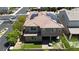 An elevated view of the backyard of this two story home with solar panels, a covered patio and low-maintenance yard at 6370 Ava Ridge Ave, Las Vegas, NV 89141