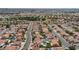 Expansive aerial view showcases neighborhood's neat streets, diverse rooflines and varied landscaping at 700 Red Bark Ln, Henderson, NV 89011