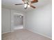 Bedroom with ceiling fan and view into the hallway at 700 Red Bark Ln, Henderson, NV 89011