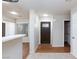 Home's entryway, showing the front door and easy access to other rooms in the house at 700 Red Bark Ln, Henderson, NV 89011