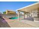 A refreshing backyard pool and hot tub provide a relaxing and private escape at 700 Red Bark Ln, Henderson, NV 89011