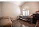 Bedroom with hardwood floors, lots of natural light, and two twin beds at 7231 Sequoia Springs Dr, Las Vegas, NV 89147