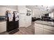 Open kitchen features stainless steel appliances, granite countertops, and ample cabinet space at 7231 Sequoia Springs Dr, Las Vegas, NV 89147
