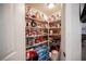 Walk-in pantry featuring ample shelving for food and storage at 7231 Sequoia Springs Dr, Las Vegas, NV 89147