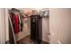 Walk-in closet featuring custom shelving and a personal safe at 7231 Sequoia Springs Dr, Las Vegas, NV 89147