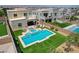 Luxury home featuring a backyard oasis with a pool, spa, and outdoor living area, ideal for entertaining at 734 Glowing Horizon St, Henderson, NV 89052