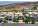 Aerial view of modern homes with desert landscaping and mountain views at 734 Glowing Horizon St, Henderson, NV 89052