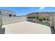 Private balcony with a view of the community pool, mountains, greenery, and surrounding landscape at 734 Glowing Horizon St, Henderson, NV 89052
