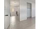 Comfortable bedroom with tiled floor and an open closet space at 734 Glowing Horizon St, Henderson, NV 89052