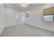 Bright bedroom with neutral walls, tile flooring, and window with blinds at 734 Glowing Horizon St, Henderson, NV 89052