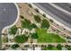 Overhead view of a community park featuring geometric landscaping, desert plants, and seating areas at 734 Glowing Horizon St, Henderson, NV 89052