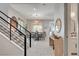 Elegant dining room features stylish chandelier, modern furniture, and bright natural light at 734 Glowing Horizon St, Henderson, NV 89052