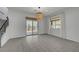 Bright dining area with sliding glass doors and neutral color palette at 734 Glowing Horizon St, Henderson, NV 89052