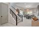 Inviting entryway featuring modern staircase and light, airy decor creating a welcoming ambiance at 734 Glowing Horizon St, Henderson, NV 89052
