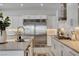 Well-equipped kitchen featuring stainless steel appliances and stylish cabinetry at 734 Glowing Horizon St, Henderson, NV 89052