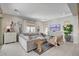Bright living room with large sectional sofa, stylish furnishings, and natural light at 734 Glowing Horizon St, Henderson, NV 89052
