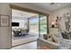 Indoor-outdoor living with sliding glass doors leading to the patio and outdoor kitchen at 734 Glowing Horizon St, Henderson, NV 89052