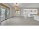 Open floor plan with bright living space, tile floors and sliding glass doors at 734 Glowing Horizon St, Henderson, NV 89052