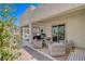 Outdoor patio featuring comfortable seating, a built-in grill, and access to the pool at 734 Glowing Horizon St, Henderson, NV 89052