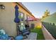 Cozy backyard with pavers, lawn, seating, and grill, perfect for outdoor gatherings at 7472 Brody Meadows St, North Las Vegas, NV 89084