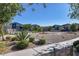 Well-maintained community park with lush landscaping, desert plants, and walking paths at 7472 Brody Meadows St, North Las Vegas, NV 89084