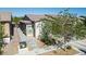 Inviting single-story home with desert landscaping, brick walkway and a single-car garage at 7472 Brody Meadows St, North Las Vegas, NV 89084