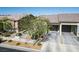 Charming single-story home featuring a desert-landscaped front yard with a single-car garage at 7472 Brody Meadows St, North Las Vegas, NV 89084