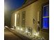 Charming home exterior featuring a well-lit walkway and cozy outdoor ambiance at 7472 Brody Meadows St, North Las Vegas, NV 89084