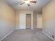 Bedroom with fan and closet featuring carpet at 7605 Lake Fork Peak St, Las Vegas, NV 89166
