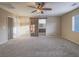 Large main bedroom featuring a barn door to en-suite bathroom at 7605 Lake Fork Peak St, Las Vegas, NV 89166