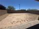 Spacious backyard with a brick perimeter wall at 7636 Bandon Cliffs St, North Las Vegas, NV 89084