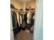 Walk-in closet with clothing racks, shelves, and plenty of room for storage at 7636 Bandon Cliffs St, North Las Vegas, NV 89084