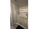 Bathroom featuring a glass door shower with chrome trim at 7636 Bandon Cliffs St, North Las Vegas, NV 89084