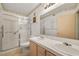 Bright bathroom features double sinks, ample counter space, and glass enclosed shower at 7950 W Flamingo Rd # 1024, Las Vegas, NV 89147