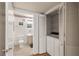Cozy bathroom features a toilet, vanity, and built in washer-dryer at 7950 W Flamingo Rd # 1024, Las Vegas, NV 89147