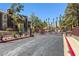 Gated entrance to the Rain Tree West condo community, offering security and curb appeal at 7950 W Flamingo Rd # 1024, Las Vegas, NV 89147