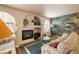 Inviting living room featuring a cozy fireplace and attractive decor at 7950 W Flamingo Rd # 1024, Las Vegas, NV 89147