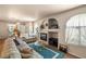Bright living room with a fireplace and a decorative display shelf at 7950 W Flamingo Rd # 1024, Las Vegas, NV 89147