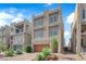 Contemporary three-story home featuring a garage and low-maintenance landscaping at 8072 Haywood Estate, Las Vegas, NV 89113