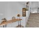 Foyer featuring a staircase and natural wood console table at 8072 Haywood Estate, Las Vegas, NV 89113