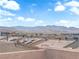 Expansive view of the mountains from this modern rooftop deck at 8072 Haywood Estate, Las Vegas, NV 89113