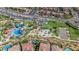 Aerial view of park with playground, basketball court, and splash pad in the Sandalwood community of Summerlin at 818 Calluna St, Las Vegas, NV 89138
