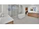 Spacious bathroom features a freestanding tub, walk-in shower, dual sinks, and modern fixtures at 818 Calluna St, Las Vegas, NV 89138