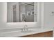 Modern bathroom sink featuring stylish faucet and illuminated mirror reflecting a shower at 818 Calluna St, Las Vegas, NV 89138