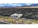 Community overview with mountain views, pools and desert landscaping at 818 Calluna St, Las Vegas, NV 89138