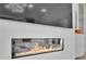 Contemporary linear fireplace built into the wall beneath a television in a modern living area at 818 Calluna St, Las Vegas, NV 89138