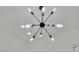 Modern and unique star-shaped lighting fixture with multiple Edison-style light bulbs at 818 Calluna St, Las Vegas, NV 89138