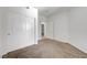 A cozy bedroom with carpet, closet, and a connecting door to another room at 900 Heavenly Hills Ct # 114, Las Vegas, NV 89145