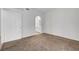 Neutral carpeted bedroom features an entry to the bathroom at 900 Heavenly Hills Ct # 114, Las Vegas, NV 89145