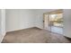 Bright bedroom featuring sliding door and closet at 900 Heavenly Hills Ct # 114, Las Vegas, NV 89145